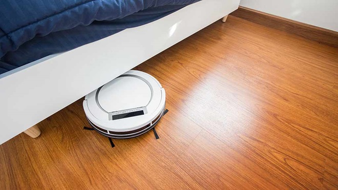 robot vacuum cleaning under bed